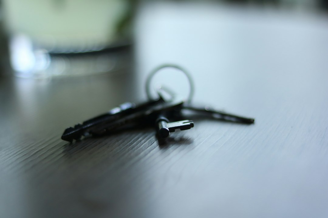 House keys resting on a table representing an heir deciding what to do with an inherited Maryland home